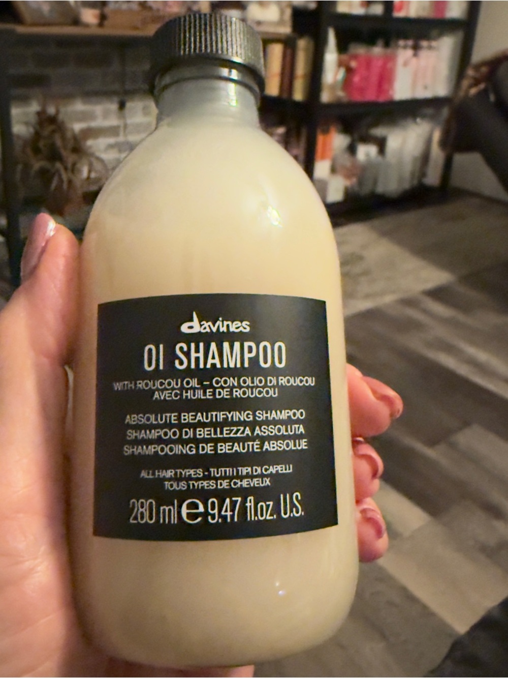 Davines OI Shampoo Bottle in Cream with Black Label